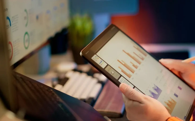 Developer looking at performance graph on computer - Amazon's Software Developer Performance Management Ecosystem