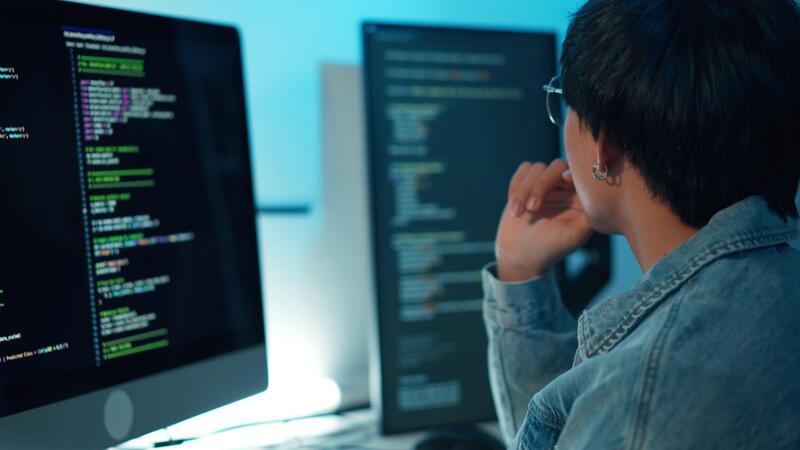 software developer debugging - Close up software developer typing code debugging system backend ...